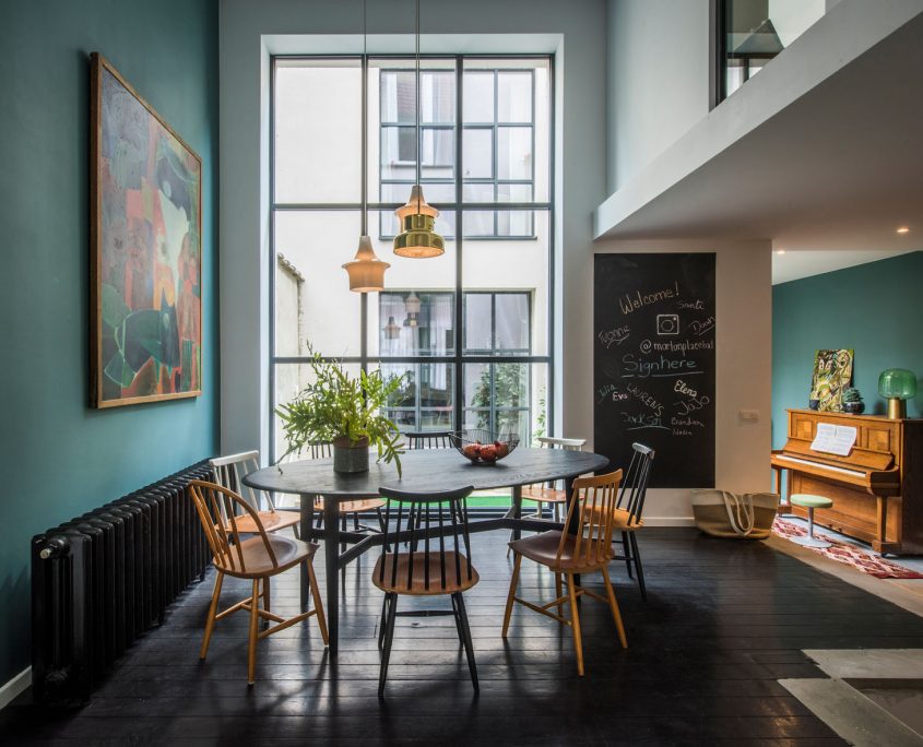 Dining area at House Louise in Brussels