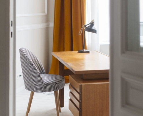 Vintage 1930's wood veneer desk with houndstooth chair