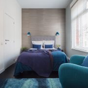 Blue bedroom front bed view