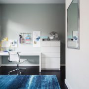 White drawers next to desk