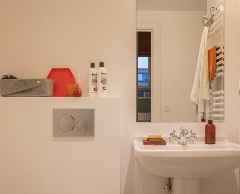 Bathroom sink and towel warming radiator