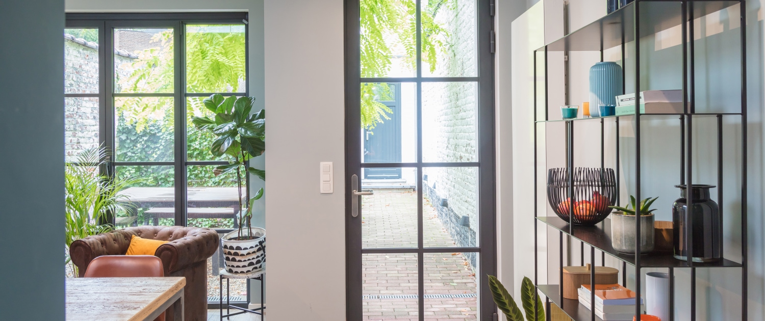 Metallic windows overlooking courtyard