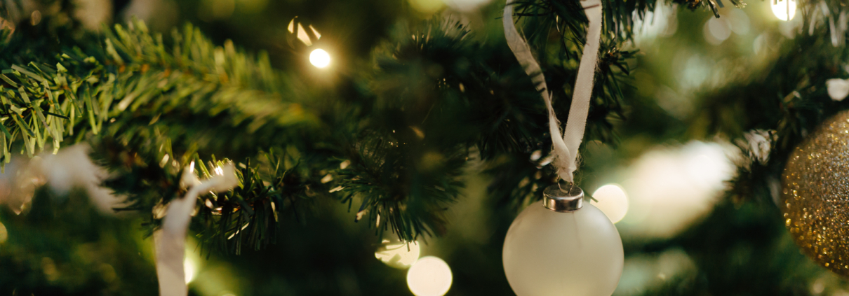 Close-up of Christmas ornaments and warm lights at Morton Place Brussels.